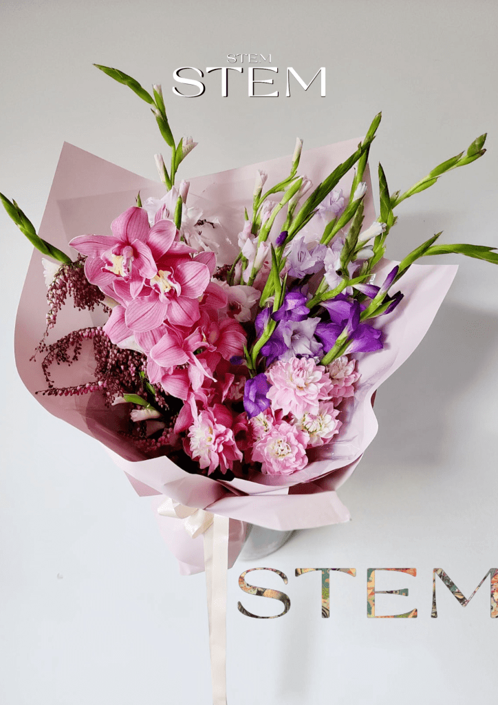Best florist in Brisbane for weddings and events – pink orchid and dahlia bouquet designed by Stem Design.