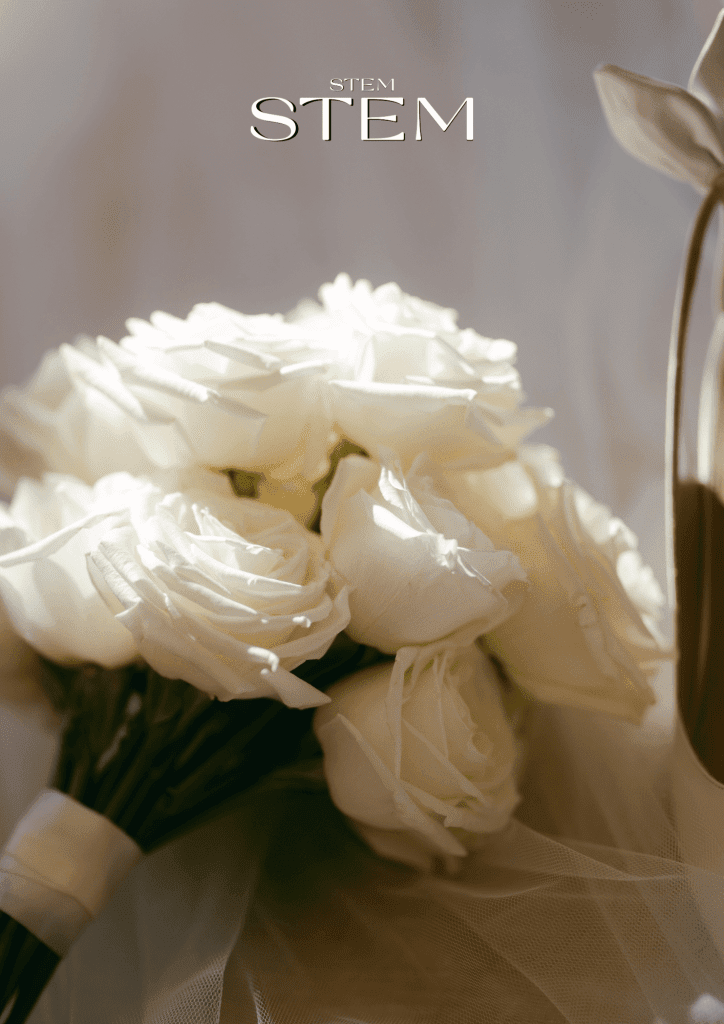 Classic white bridal bouquet made from soft white roses styled for a Brisbane wedding.